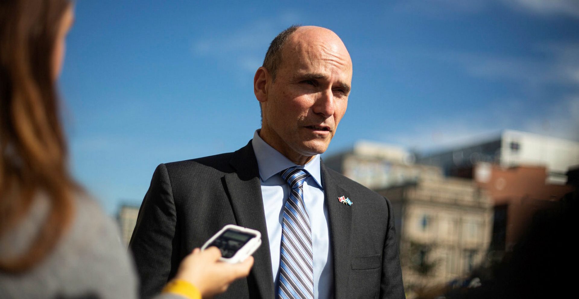 Minister of Health Jean-Yves Duclos peaks with reporters outside West Block on Oct. 4, 2022, before Question Period. The Hill Times photograph by Andrew Meade