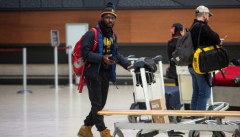 Travellers wait at the baggage claim at the Ottawa Macdonald-Cartier International Airport on Nov. 28, 2022.  Andrew Meade