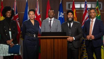 Member representing the Black Class Action Secretariat, along with partner Amnesty International Canada, hold a press conference in West Block on Sept. 28, 2022, to make an announcement regarding next steps in their joint push for justice for Black Canadians facing human rights violations in Canada’s public service. The Hill Times photograph by Andrew Meade